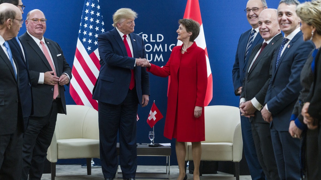 La presidente della Confederazione Simonetta Sommaruga e il presidente degli Stati Uniti Donald Trump